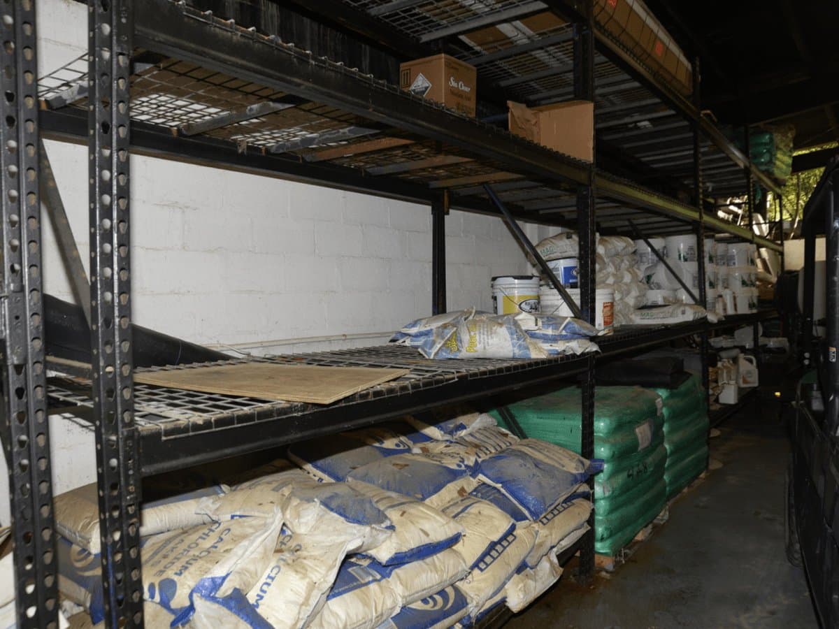 Organized storage shelving for furniture awaiting redistribution